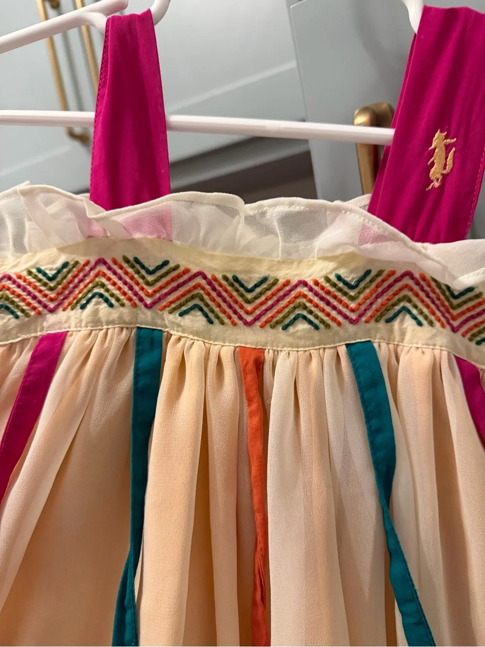 Well Dressed Wolf Cream Chiffon Dress with Pink Straps and Teal & Orange Ribbons